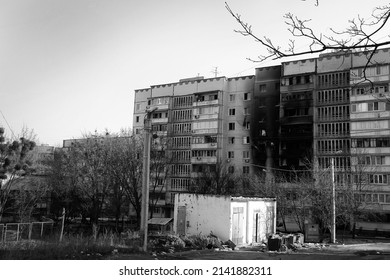 Terrible, bloody war of Russia against Ukraine. Destroyed houses of people in Kharkov after the shelling. February, March, April 2022 Ukraine. Black and white photo of the war.