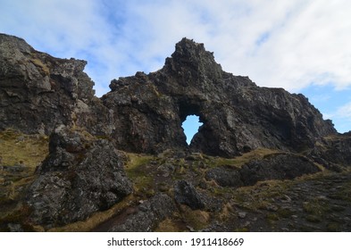 Terrific Looking Rock Formation With A Natural Doorway In Iceland.