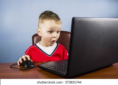 Terrified Child Plays Computer