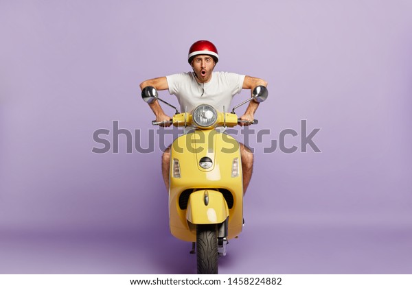 Terrified Moped Driver Drives On High Stock Photo (Edit Now) 1458224882