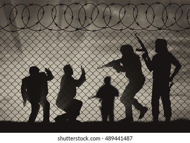 Terrorism concept. Terrorist attack on civilians near the fence of barbed wire