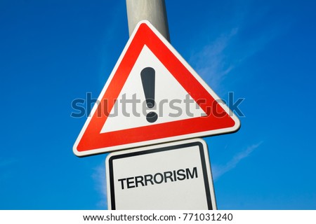 Terrorism - exclamation mark to alert, warn caution - danger and threat of terror and terrorist attack and assault made by radicals and extremist. Alert and warning because lack of security