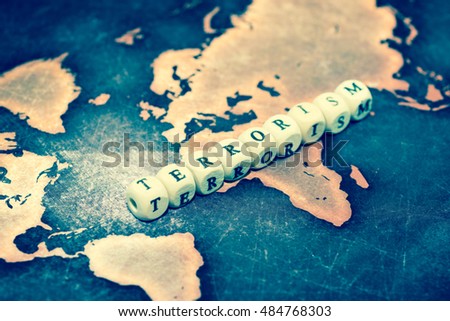 TERRORISM on grunge world map