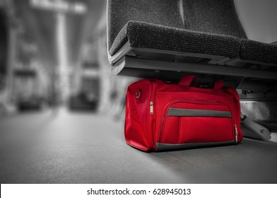 Terrorism and public safety concept with unattended bag left in a subway cart, train carriage or monorail. Travelers should report suspicious items to the police or security staff with copy space
