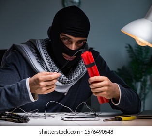 Terrorist bomber preparing dynamite bomb
