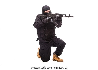 Terrorist With Machine Gun On White Background