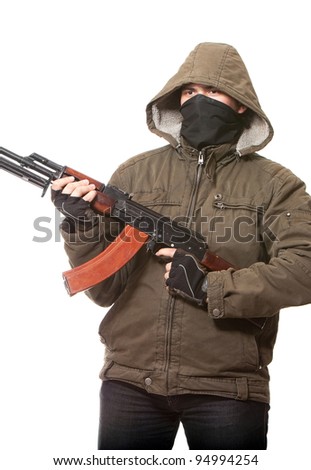 Terrorist with weapon on a white background