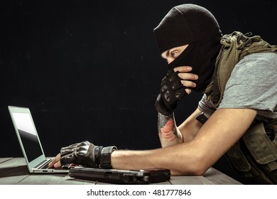 Terrorist Working On His Computer