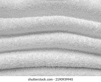 Terry Cloth White Towel With A Folds As A Background