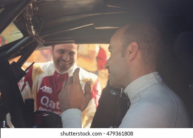 TERUEL, SPAIN - JUL 23 : Spanish Driver Xavi Pons Talking To Nasser Al Attiyah In The XXXIII Baja Spain, On Jul 23, 2016 In Teruel, Spain.