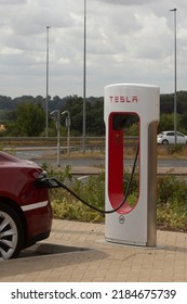 Tesla Electric Vehicle Charging Station In Use. Norwich, UK - 28th July 2022