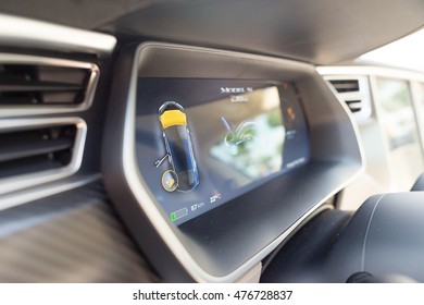 Tesla P85D Electric Car Car Dashboard Screen And Interior While Recharging Batteries At Eldrive Charging Point, Sofia, Bulgaria, August 29, 2016.