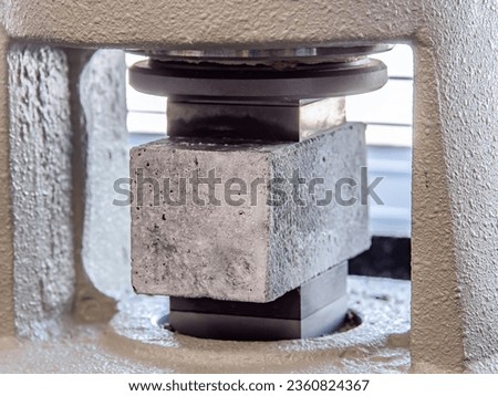 Similar – Image, Stock Photo Test of cement compressive strength according to standards, properties of engineered composite materials and cement strength are tested in the physics laboratory.