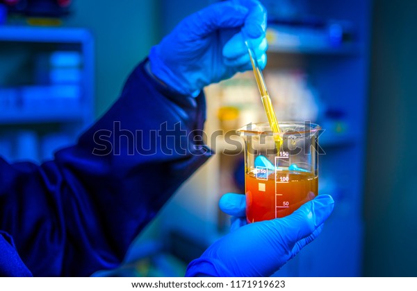 Test of chemical reaction. Check the
viscosities of the chemical. Chemical laboratory. Research in
Chemistry. The lab assistant does the
work.