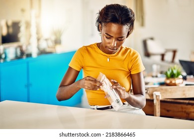 Test For Covid, Corona Virus Or Infection With A Rapid Antigen Test Kit At Home. Young And Casual Woman Unpacking A Screening Kit To Diagnose An Illness, Sickness Or Infectious Viral Disease