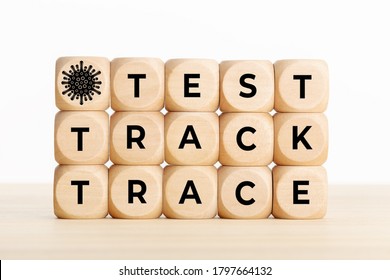 Test Trace Track Covid-19 Coronavirus Concept. Wooden Block With Text On Wooden Table