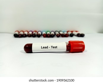 Test Tube With Blood Sample For  Lead (Pb) Test. Blood Toxicity Testing. A Medical Testing Concept In The Laboratory Background.