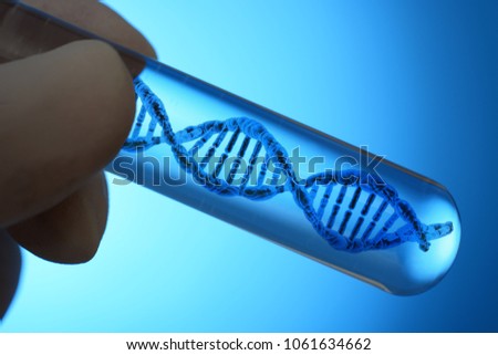 Test tube with DNA double helix as a symbol for genetics, genetic engineering and heredity
