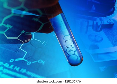 Test tube with formula inside in arm. Macro image with selective - Powered by Shutterstock