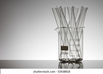 test tubes in a beaker with a white background