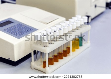 Test tubes with multi-colored reagent analysis. Colorimetry expe