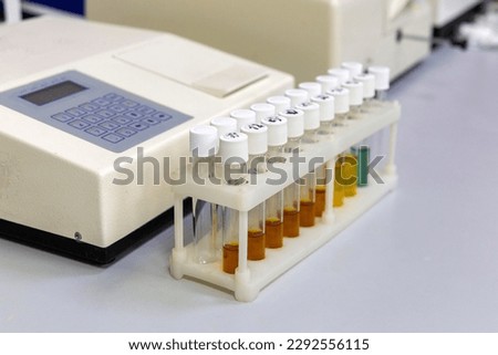 Test tubes with multi-colored reagent analysis. Colorimetry expe