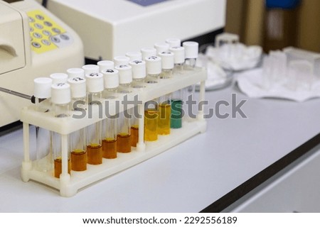 Test tubes with multi-colored reagent analysis. Colorimetry expe