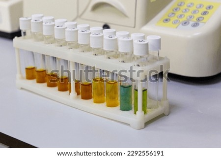 Test tubes with multi-colored reagent analysis. Colorimetry expe