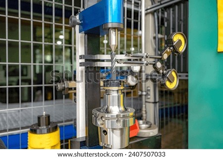 Testing and checking cutting tools for runout on a stand in the centers using indicators.
