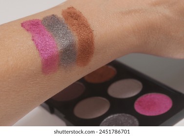 Testing Colorful Cosmetics on Arm Close up - Powered by Shutterstock - Get 15% off with code: PIKWIZARD15