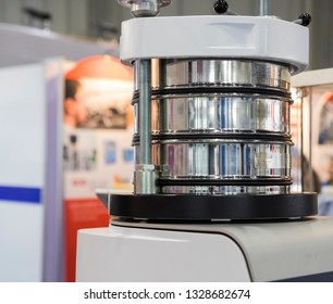 Testing Size Of Material By Sieve Analysis For Laboratory ; This Process Using Shaking Process And Steel Wire And Measure Weight Of Remained Sample Of Each Steel Mesh ; Industrial Background