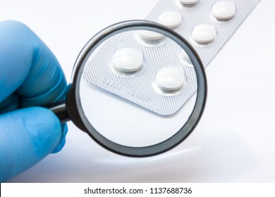 
Testing, verification and determining pharmaceutical counterfeiting or fakes of medicines and medicinal substance quality concept. Pharmaceutical expert from checks number of medicine compliance