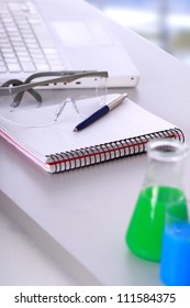 Test-tubes and a computer