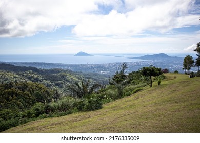 Tetetana hilss, Kumelembuai, Tomohon with various background.  From the top, we can see Manado city, Bitung, and Tomohon.