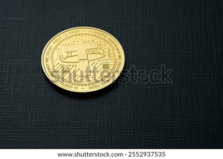Tether cryptocurrency isolated on black textured background and copy space