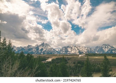 Teton Range Under A Dramatic Cloudy Sky