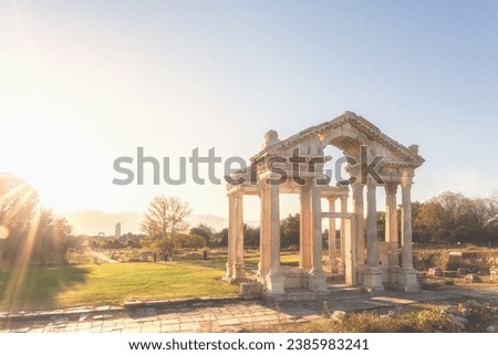 Tetrapylon. The monumental gateway to the Temple of Aphrodite in ancient Aphrodisias as seen against light at sunset time. Turkey (Turkiye) ストックフォト © 