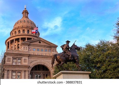 The Texas Capitol Building/ Texas Capitol and Ranger Statue/ The Texas Ranger statue in front of the Texas Capital building in Austin, TX