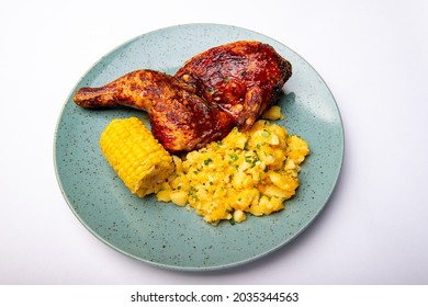 TEXAS CHICKEN Half A Chicken Marinated In Texas BBQ And Then Grilled To Perfection With Squeezed Cheddar Potatoes And Corn.