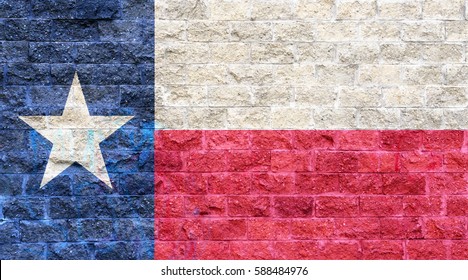 Texas flag painted on old brick wall