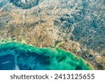 Texas Gulf Coast. An astronaut captured this wide view from flat and humid coastal wetlands and barrier islands to rocky inland hills. Elements of this image furnished by NASA.