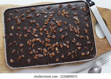 Texas Sheet Cake. Buttery And Chocolaty Cake Inside The Baking Bin. Fresh From Oven. Shot On White Background