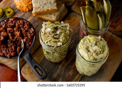 Texas Smokehouse Bbq Traditional Sides. Pork N Beans, Coleslaw, Potato Salad, Pickeled Onions, Cucumbers Jalapenos Homemade Corn Bread Typically Served With Bbq Meats And Chicken. 