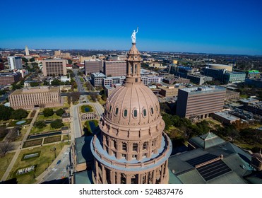 Texas State Capitol building aerial view from high above dome with view of horizon of Texas hill country Austin TX