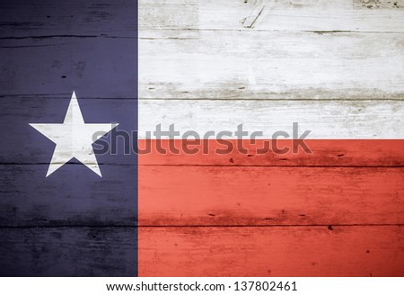 Texas State Flag on barn wood, with faded colors