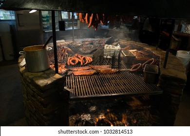 Texas Style Bbq Pit Smoked Meats Ribs Sauce Over Wood Flame