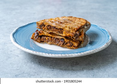 Texas Style Slow Cooked BBQ Beef Sandwich With Toast Bread Or Toasted Rye Bread. Philly Cheese Steak Half Cut.