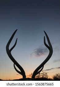 A Texas Sunset Beautifully Silhouettes Axis Deer Antlers On A Summer Night.