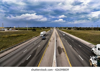 TEXAS, UNITED STATES - NOVEMBER 5, 2015: Trucks On Interstate 35 Near Austin, Tx