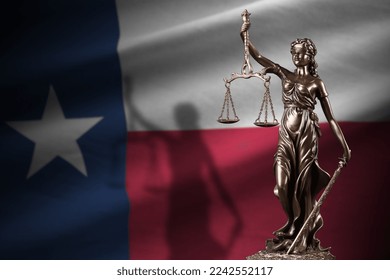 Texas US state flag with statue of lady justice and judicial scales in dark room. Concept of judgement and punishment, background for jury topics